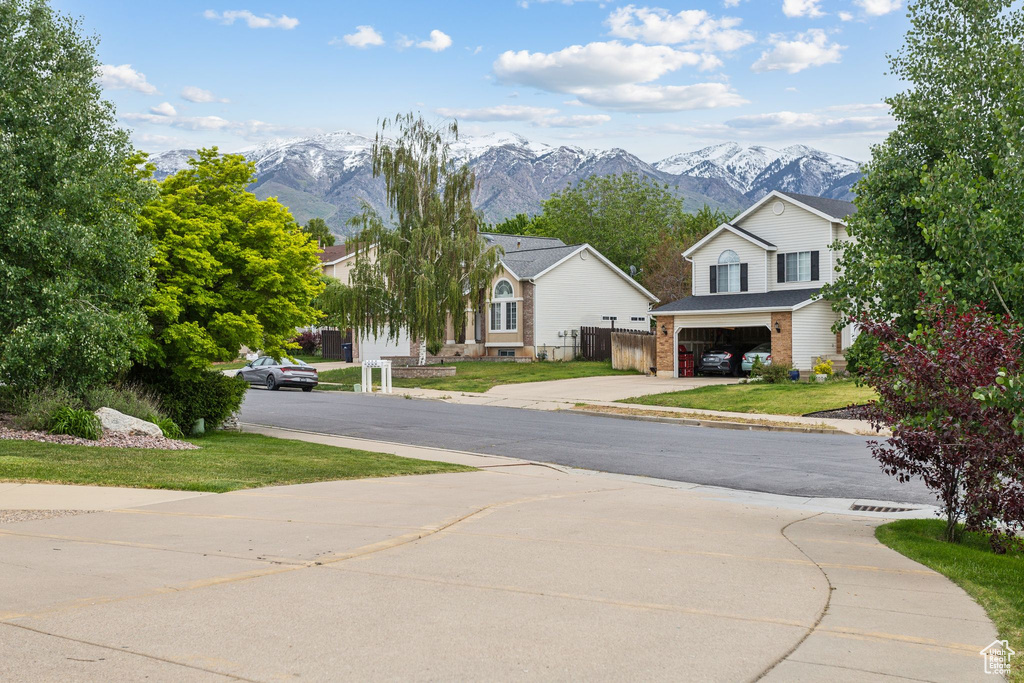 View of street featuring a mountain view and sidewalks