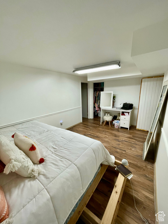 Bedroom featuring wood finished floors