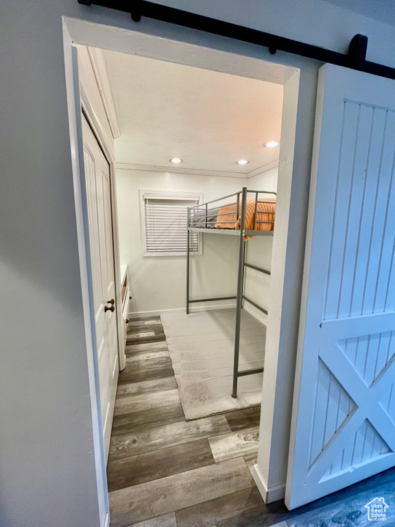 Spacious closet featuring wood finished floors
