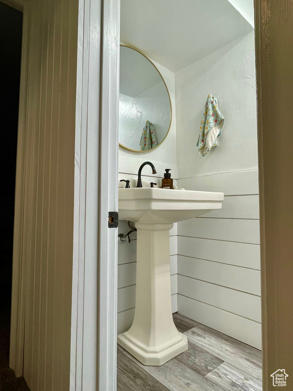 Bathroom featuring wood finished floors