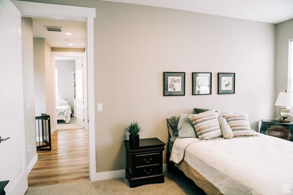 Bedroom featuring baseboards and recessed lighting