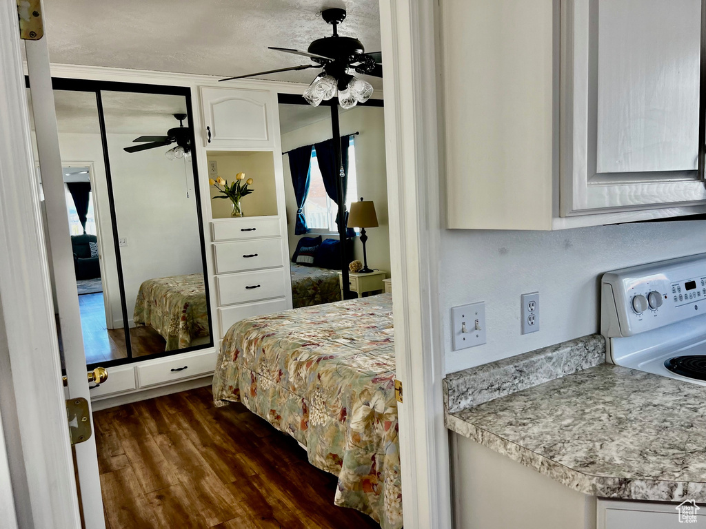 Bedroom featuring wood finished floors