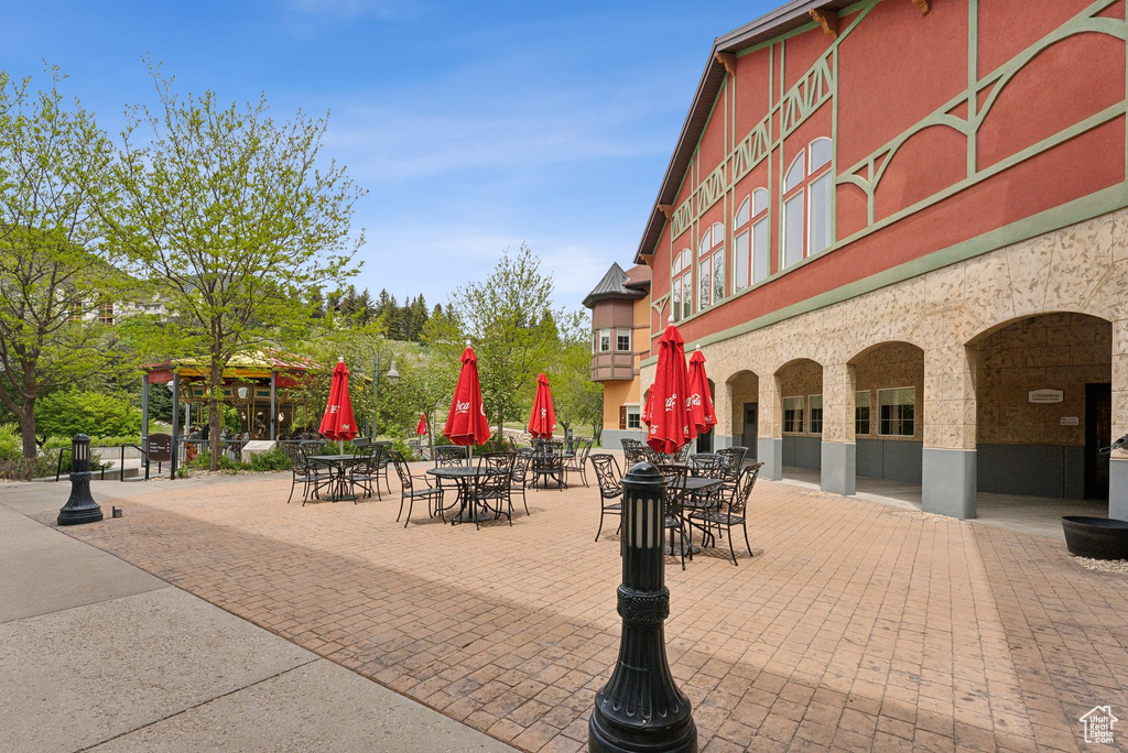 View of property\\\'s community featuring outdoor dining area