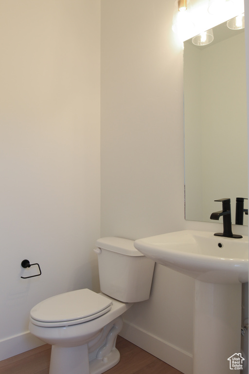 Bathroom with wood finished floors