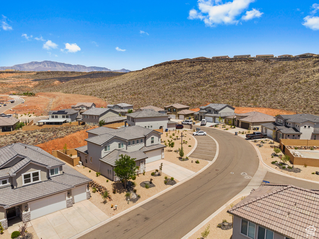 Aerial view of residential area with mountains