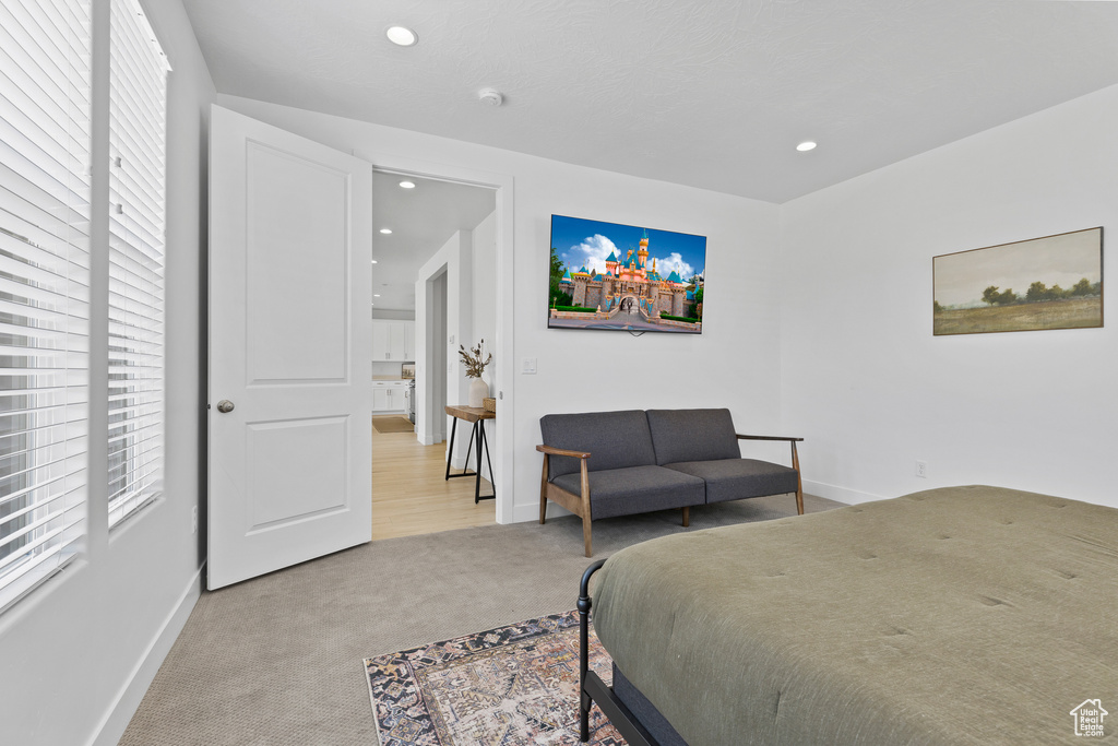 Bedroom featuring carpet, baseboards, and recessed lighting