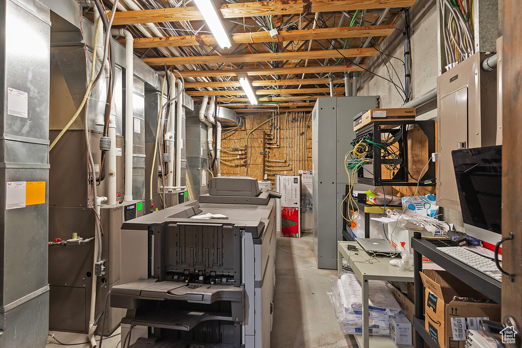 Unfinished basement featuring a workshop area