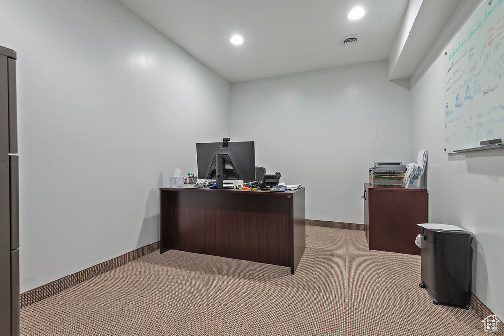 Office area featuring light colored carpet, recessed lighting, and baseboards
