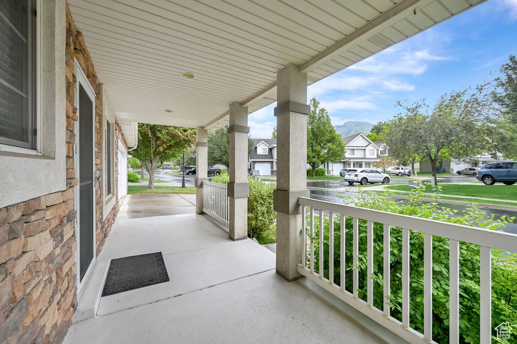 View of patio featuring a porch and a residential view