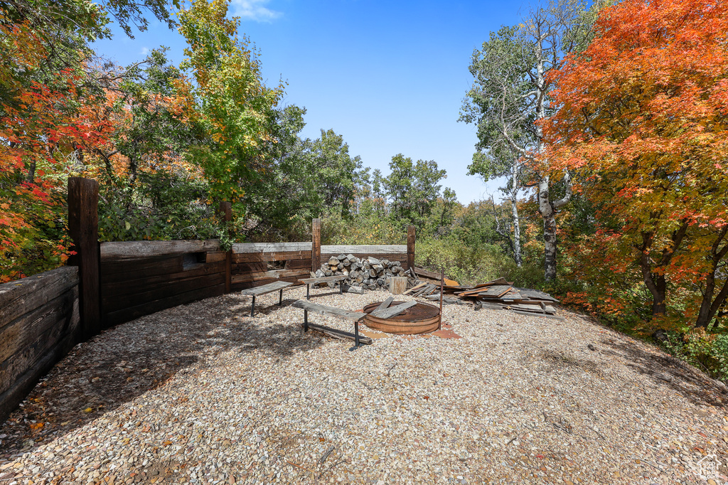 View of yard featuring a fire pit