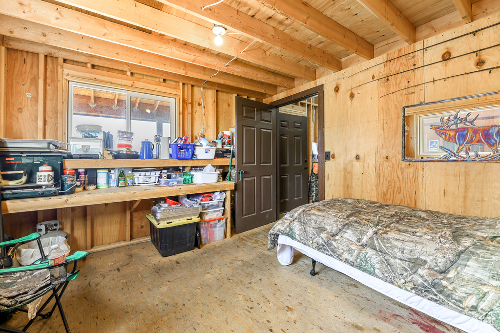 Bedroom featuring beamed ceiling