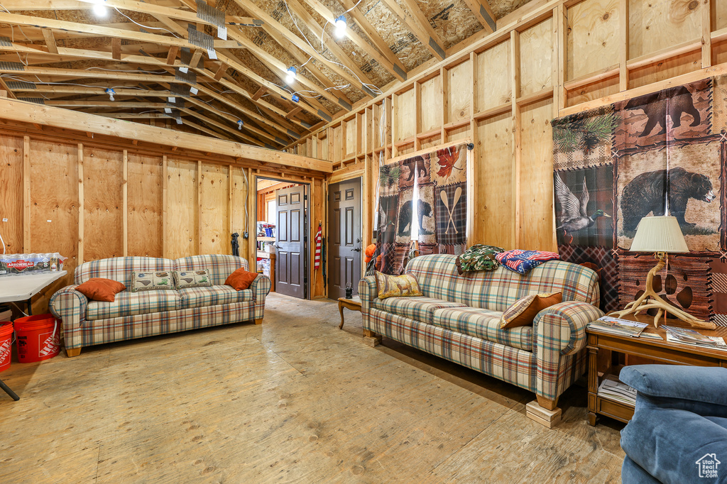 Living room featuring lofted ceiling