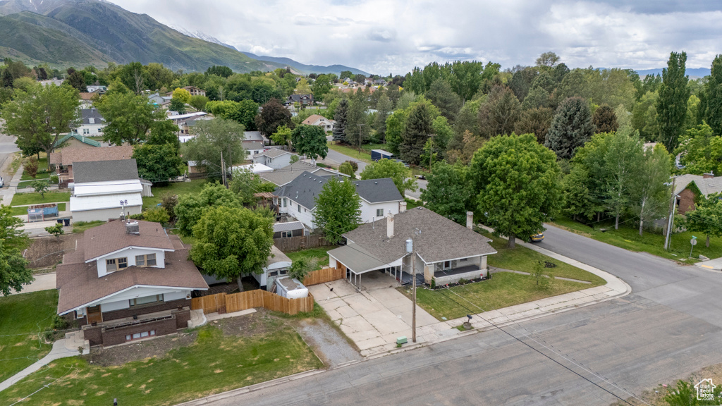 Aerial view of residential area with a mountainous background