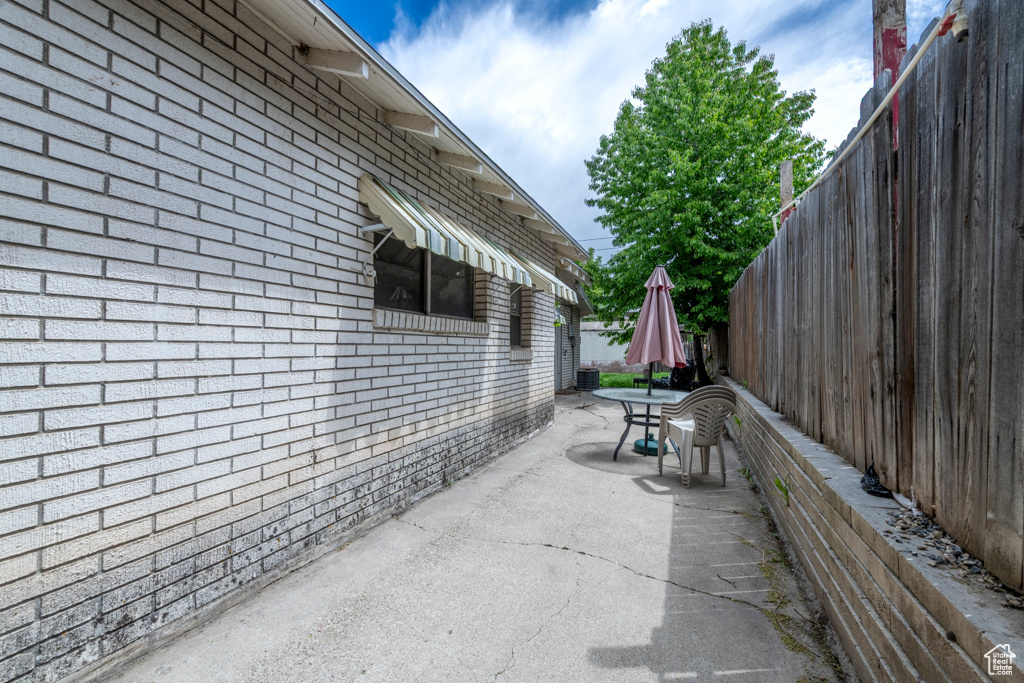 View of patio / terrace featuring fence