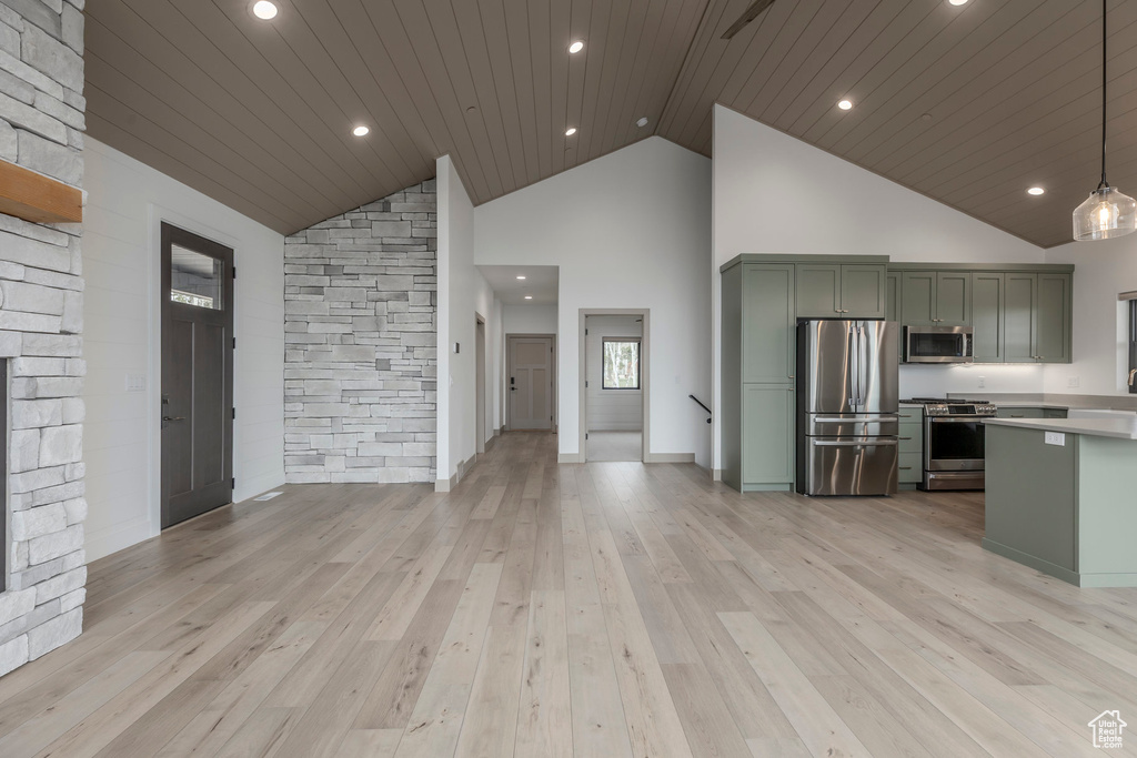 Unfurnished living room featuring light wood-type flooring, high vaulted ceiling, wooden ceiling, and recessed lighting