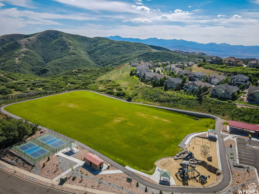 Aerial view of residential area with mountains