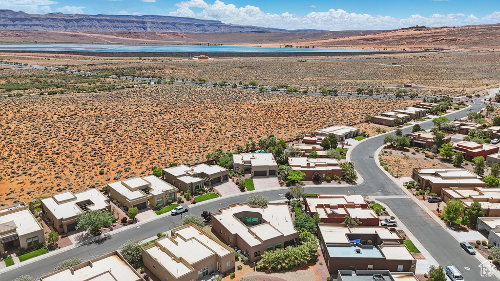 Aerial view of residential area featuring a water and mountain view