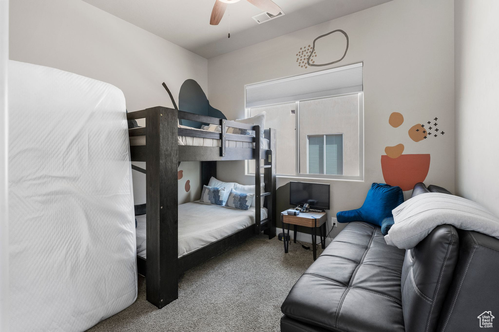 Bedroom with carpet floors and ceiling fan