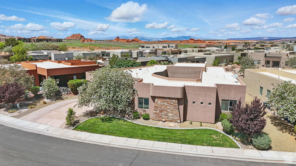 Aerial perspective of suburban area featuring mountains