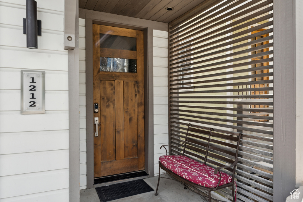 Entrance to property featuring a porch