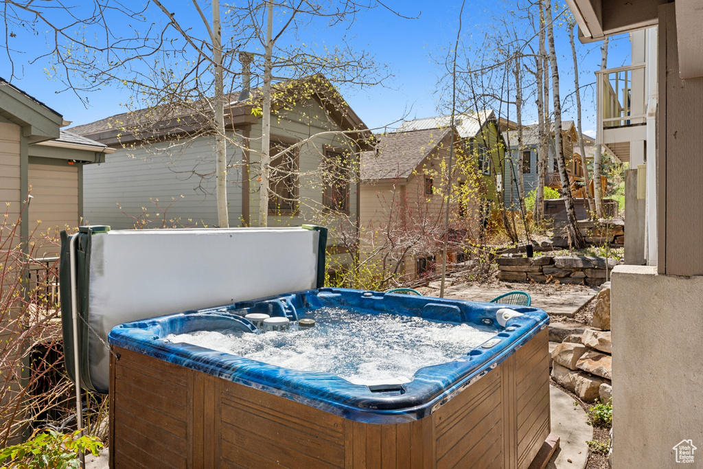 View of patio / terrace with a hot tub
