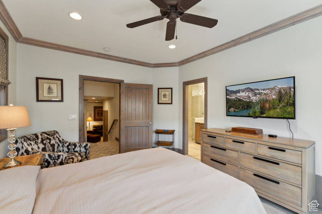 Bedroom featuring ornamental molding, ensuite bathroom, recessed lighting, light tile patterned floors, and a ceiling fan
