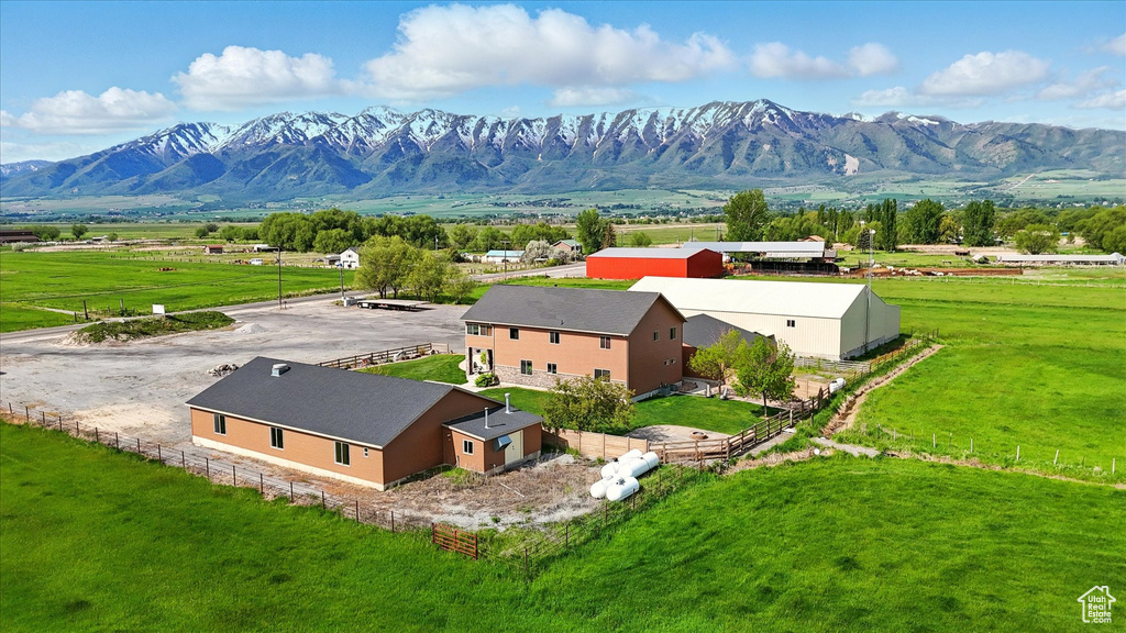 View of mountain backdrop featuring rural landscape