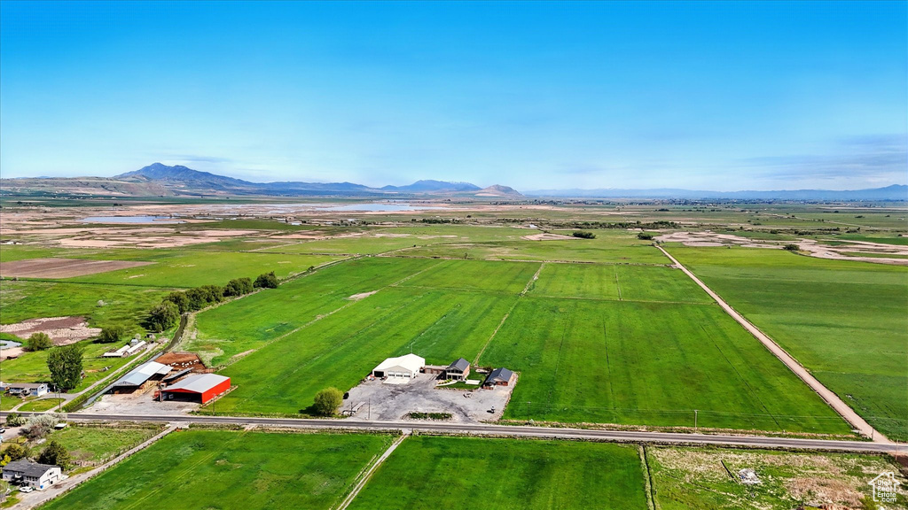 Aerial view of sparsely populated area with a mountainous background