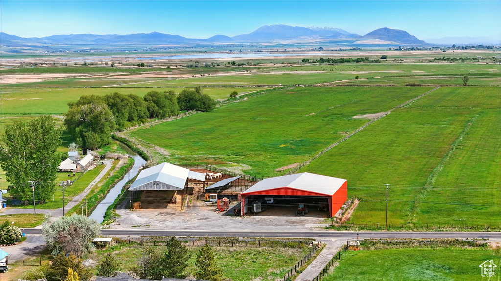 Aerial view of sparsely populated area featuring a mountain backdrop