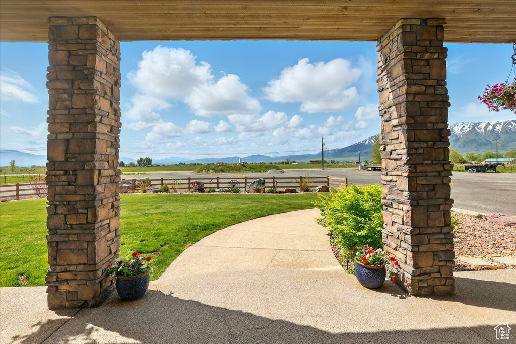 View of patio / terrace with a mountain view