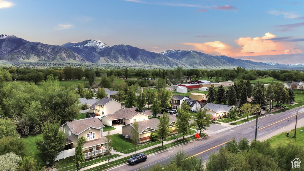 Aerial view at dusk of a mountain view and a residential view