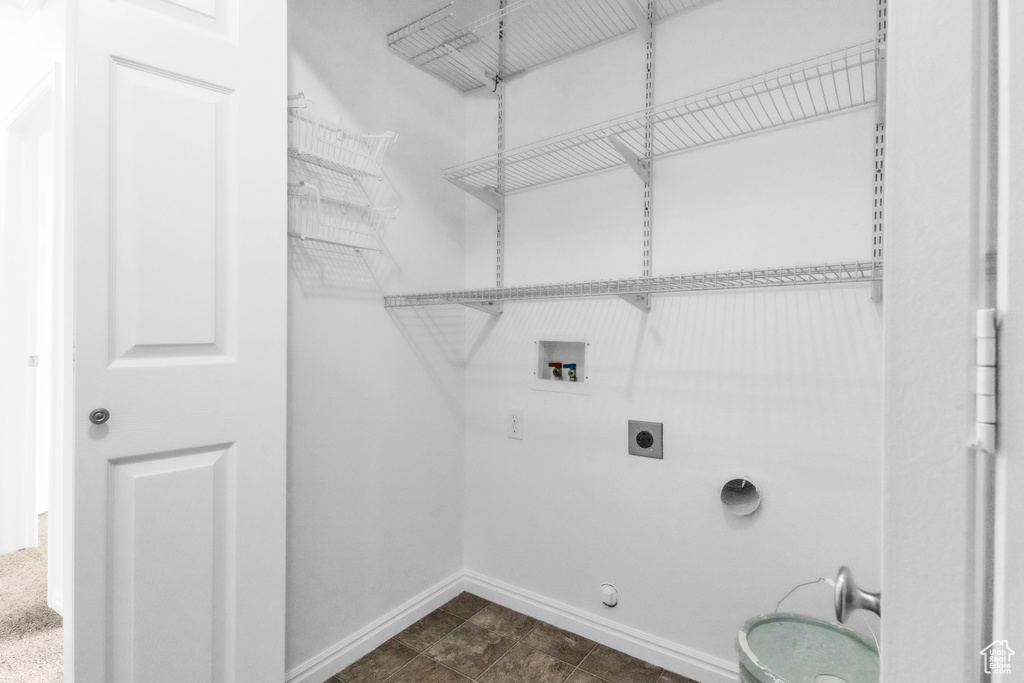 Laundry room featuring electric dryer hookup, washer hookup, baseboards, and gas dryer hookup