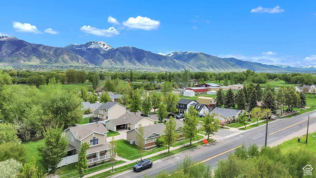 Aerial view of residential area featuring mountains