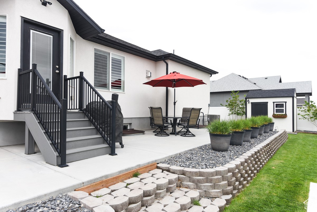 View of patio / terrace featuring an outdoor structure