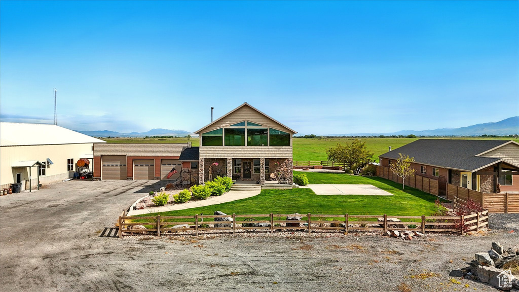 View of front of property with a mountain view
