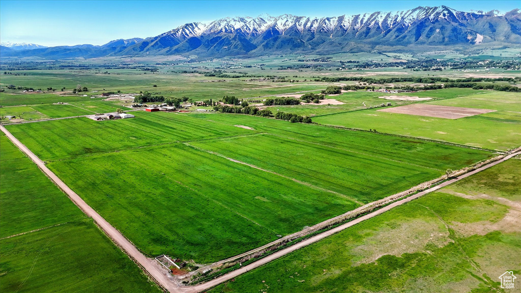 Overview of rural landscape with a mountain backdrop