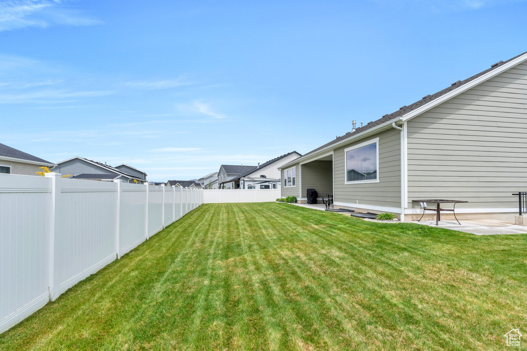 View of yard featuring a patio area