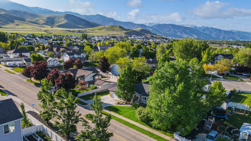 Aerial view of residential area featuring mountains