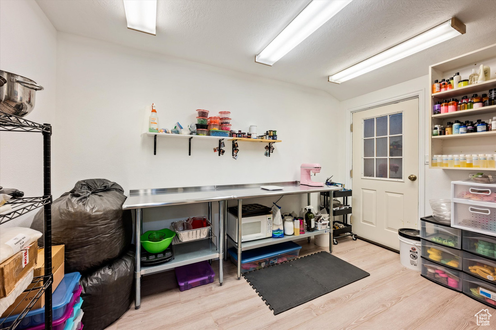 Misc room with light wood-style floors