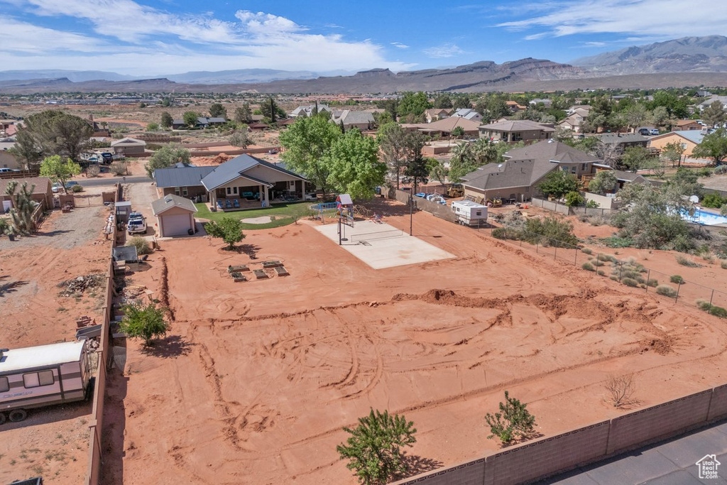 Aerial view of residential area with a mountainous background