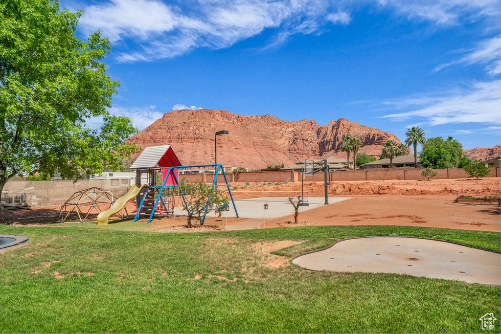 Community playground with a mountain view