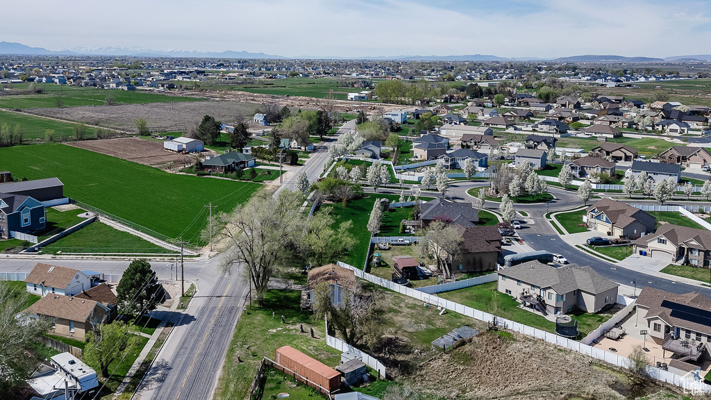 View of property location with mountains and nearby suburban area