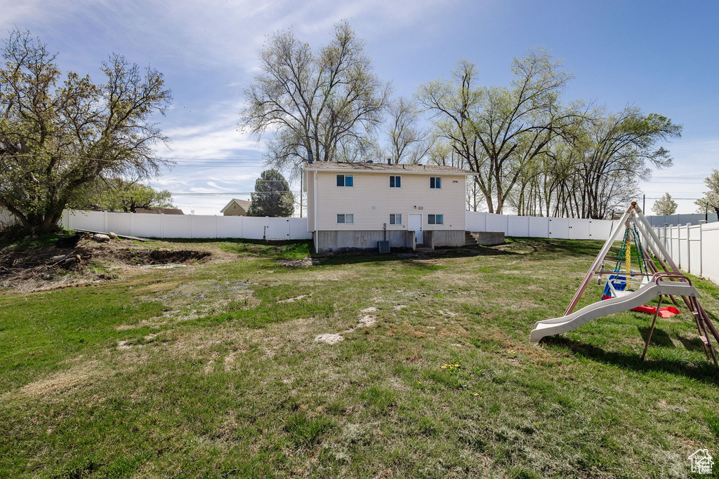 View of yard with a playground