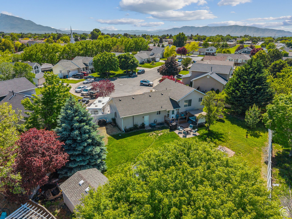 Aerial perspective of suburban area featuring mountains