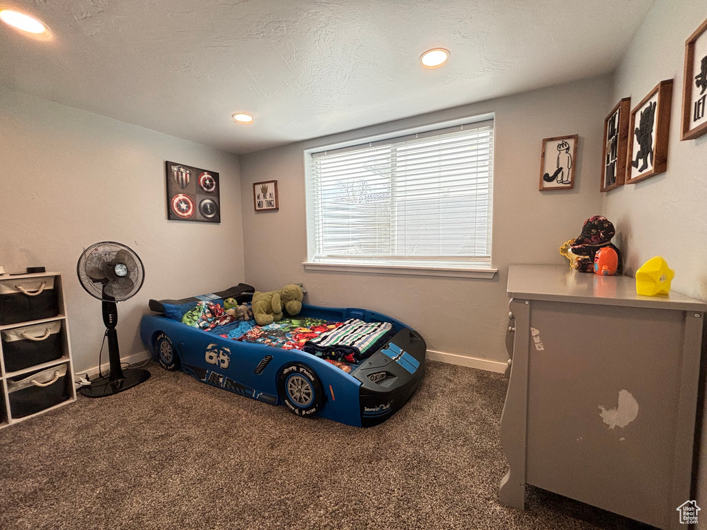 Bedroom featuring carpet, baseboards, and recessed lighting