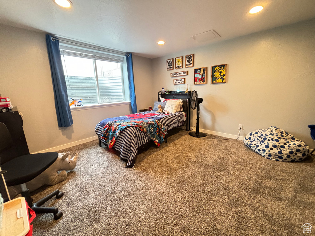 Bedroom with carpet, recessed lighting, and baseboards