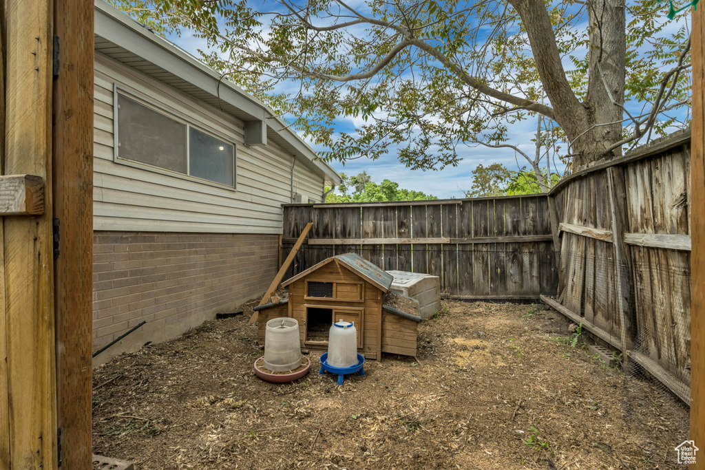 View of yard with fence