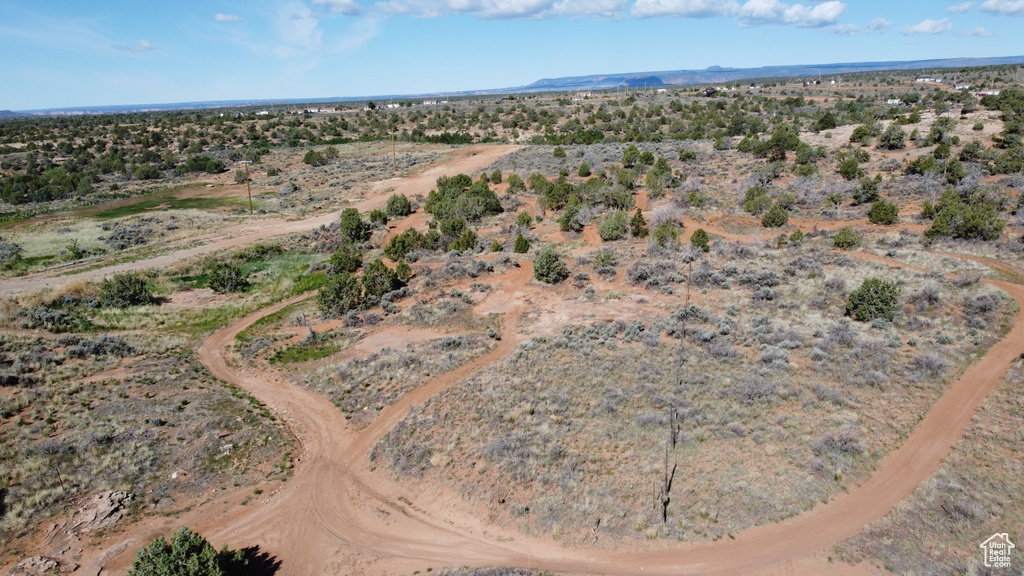 Aerial overview of property\'s location featuring a desert landscape, rural landscape, and a mountainous background