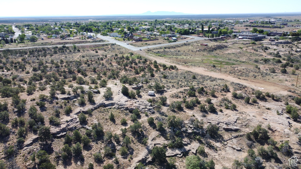Aerial view of property and surrounding area featuring rural landscape