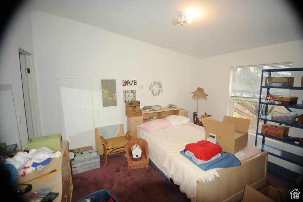 Bedroom featuring carpet flooring